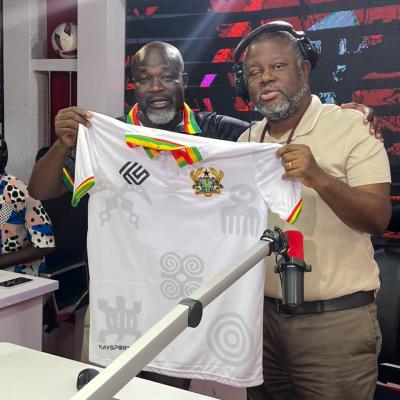 Kaysports presents branded Ghana sports jersey to Sporty FM's Fiifi Banson
